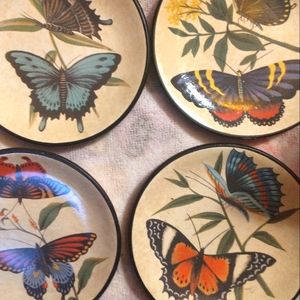 4  Pottery side dishes , coasters or hang for beautiful decor .